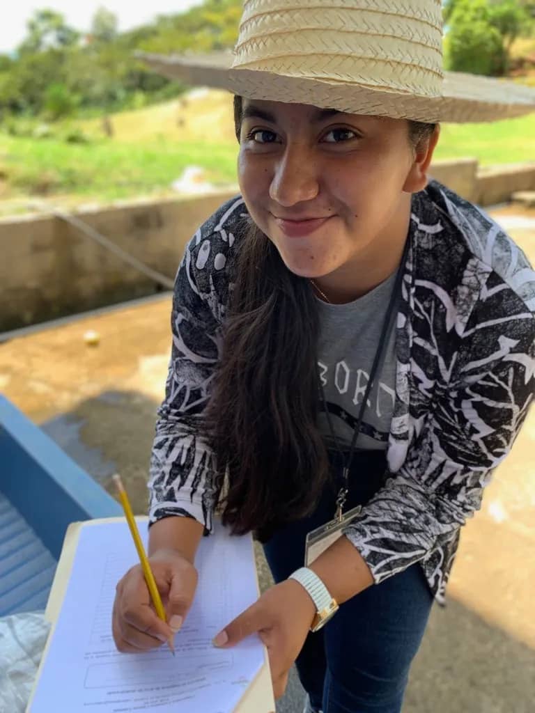 young woman taking notes