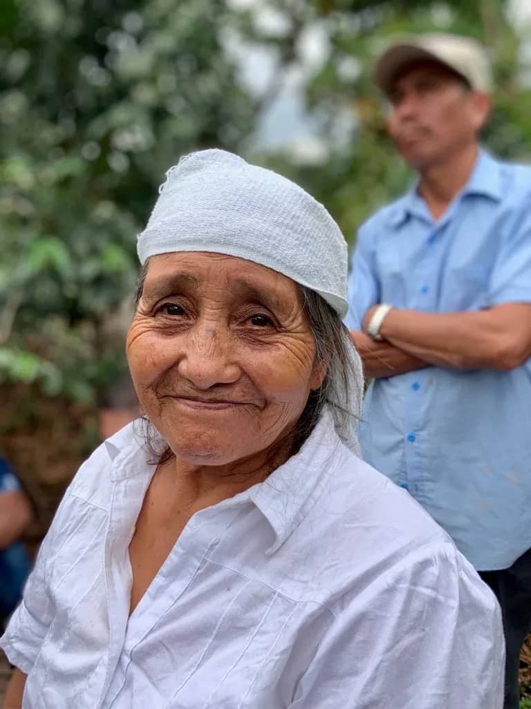  old woman worker smiling at the camera
